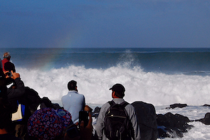 Rainbow just barely visible in the mist following the fury.